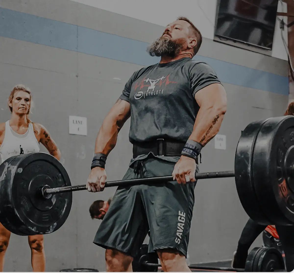 An athlete performing a deadlift at Paradigm Fitness